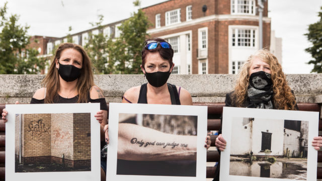 Members of the group during a 14 minute silence in Hull